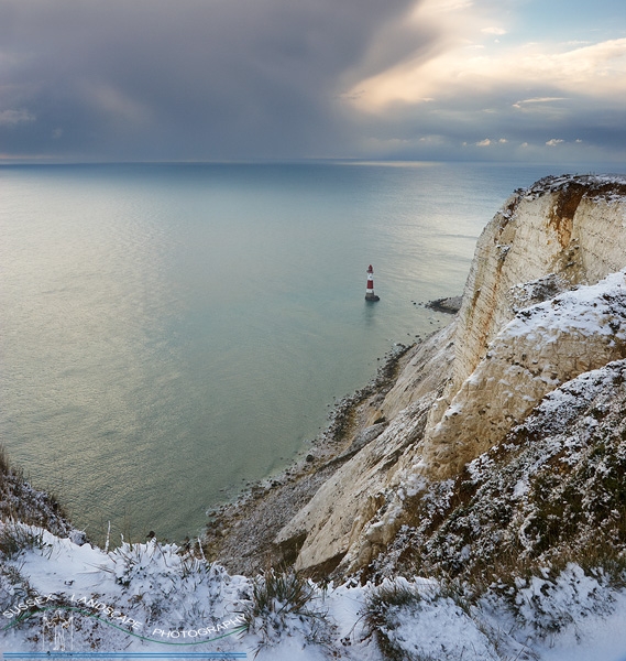 slides/Beachy Head in Snow.jpg sussex coast,east,west,chalk,beachy head,lighthouse,winter,snow,water,sunset,clouds,cold,storm,sussex landscape photography by simon parsons,cliff top,landscape in snow Beachy Head in Snow